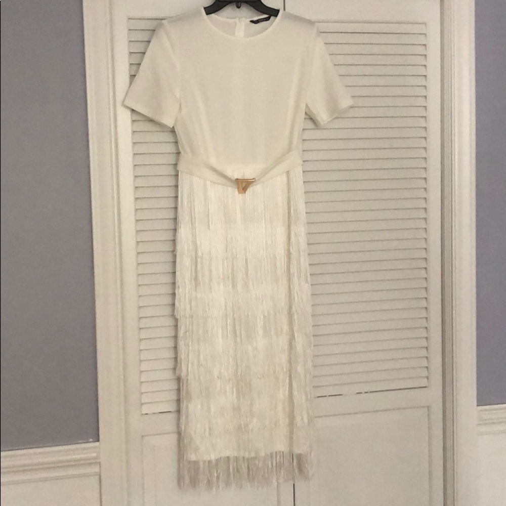 New, never worn, White with fringe dress